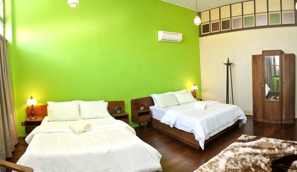 Yong Yi Yuen Guesthouse Τζωρτζ Τάουν Δωμάτιο φωτογραφία
