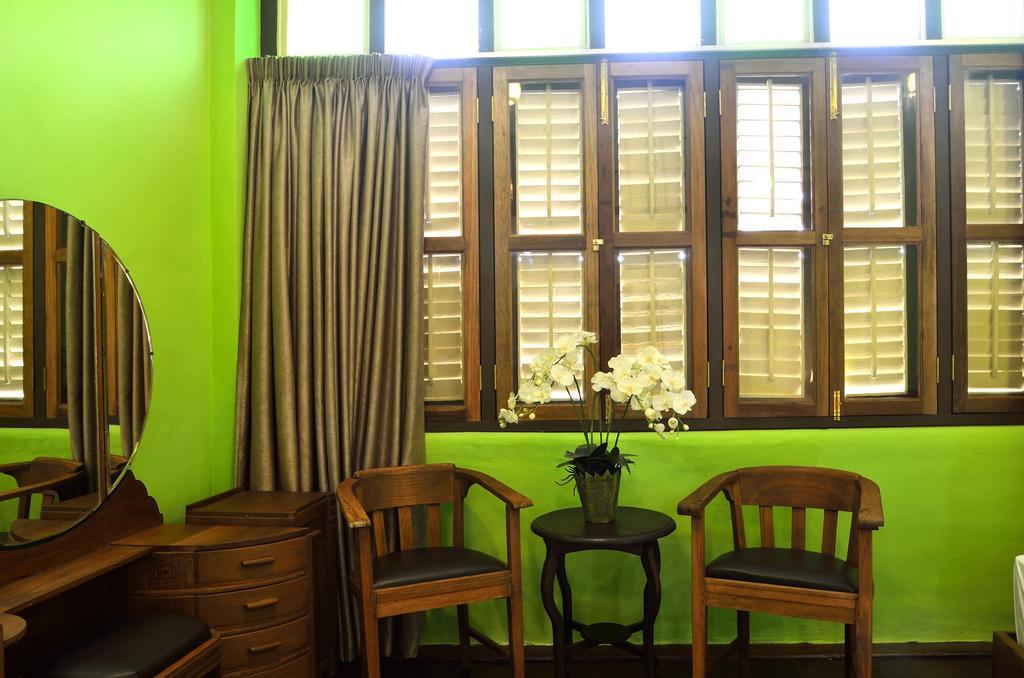 Yong Yi Yuen Guesthouse Τζωρτζ Τάουν Δωμάτιο φωτογραφία