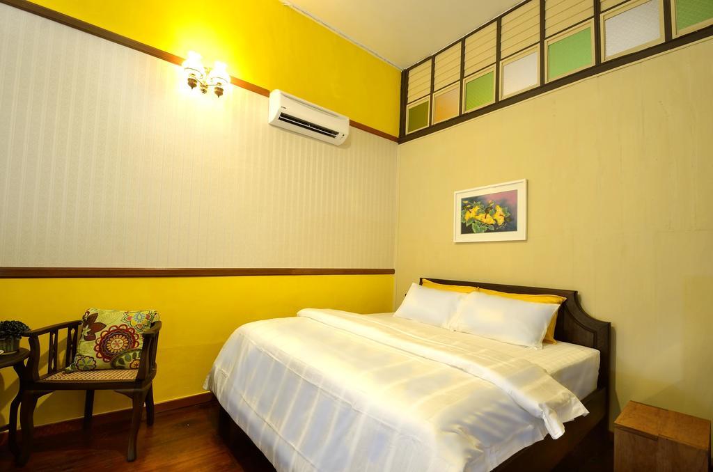 Yong Yi Yuen Guesthouse Τζωρτζ Τάουν Δωμάτιο φωτογραφία